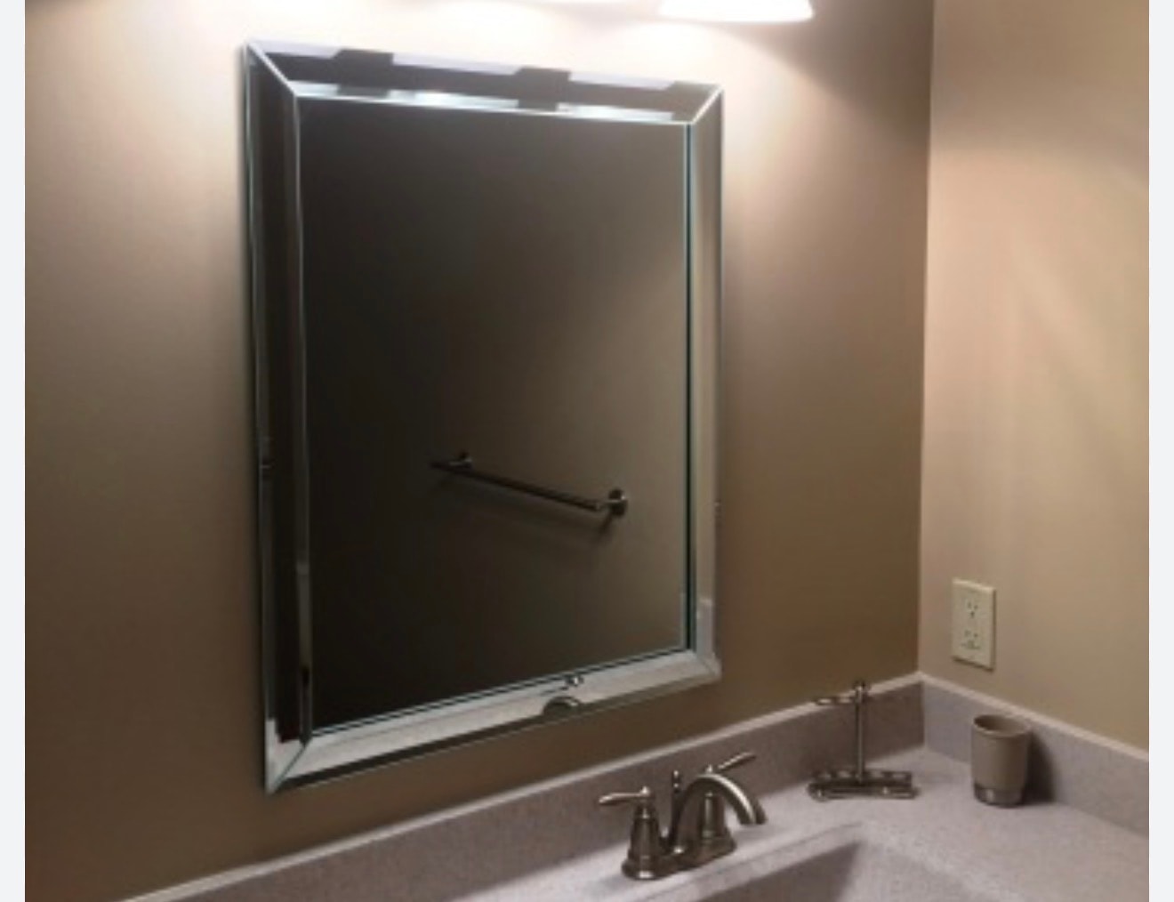 Bathroom vanity with large custom mirror